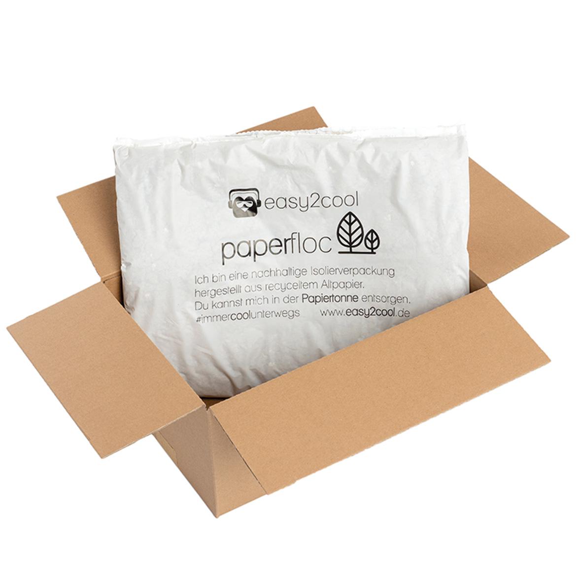 Geöffneter Versandkarton mit Paperfloc-Isoliertasche für gekühlte Delikatessen