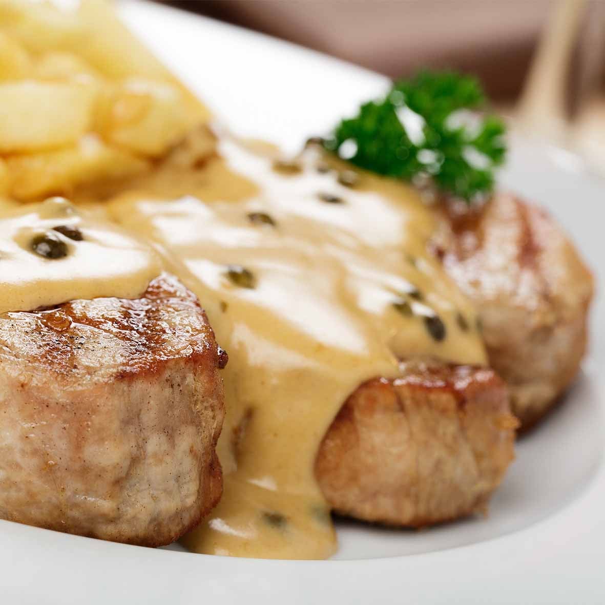 Schweinemedaillons in Orangen-Pfefferschmand – Filetstücke in fruchtig-pikanter Rahmsauce (2 x 250 g)